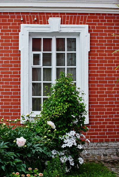 white window on a red brick wall - Виктор 