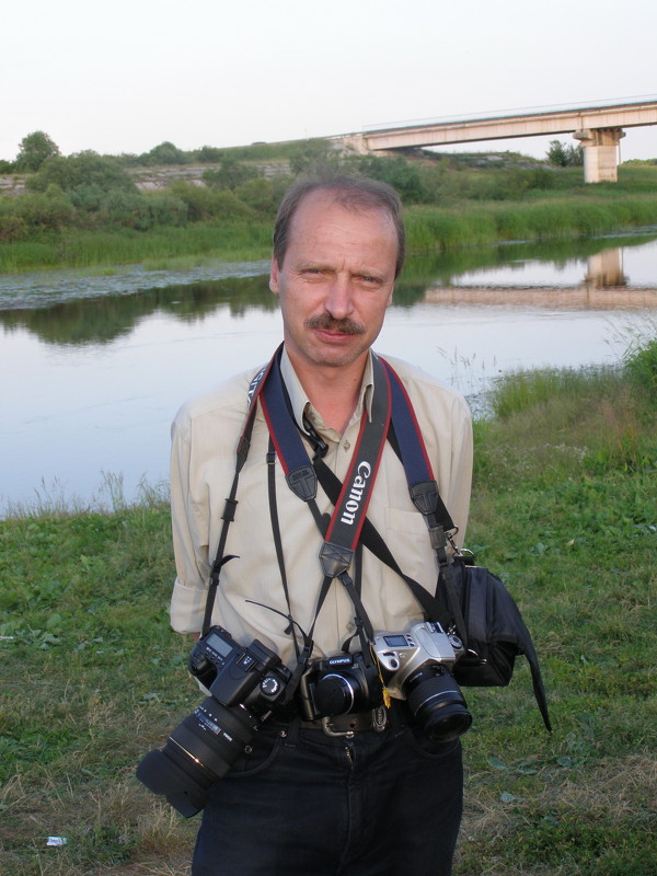 Человек с фотоаппаратом - Николай ntv