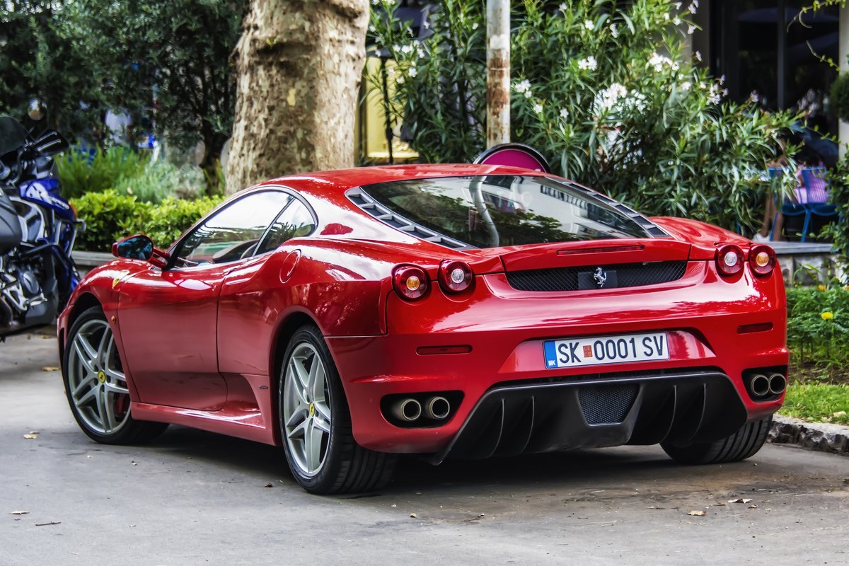 super powerful and very red sports car - Dmitry Ozersky