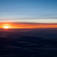 Закат с высоты полета самолета :: Евгений Путинцев