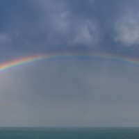 Rainbow over a green cape :: Tutsan 