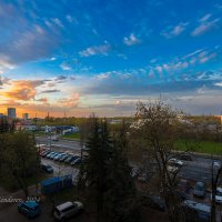 Закат над городом :: Александр Синдерёв