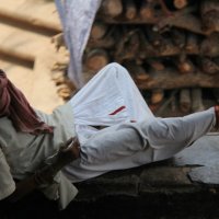 Drug addict dreaming. Varanasi. India. :: Eva Langue