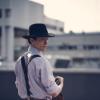Красивый парень в шляпе одетый в стиле нуар на фоне города :: Иван Егоров