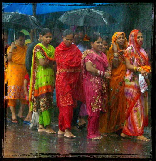 Monsoons Showers Indian women colorful saris