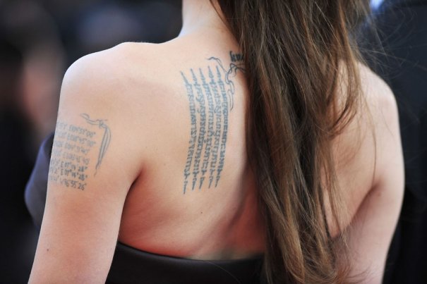 64-й Канский Фестиваль, знаменитые татуировки Анжелины Джоли, фото: Pascal Le Segretain