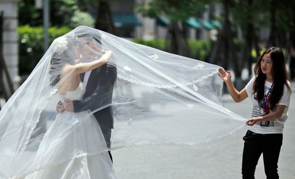 (AP Photo/Eugene Hoshiko)