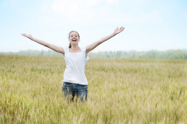 Happy woman in the field