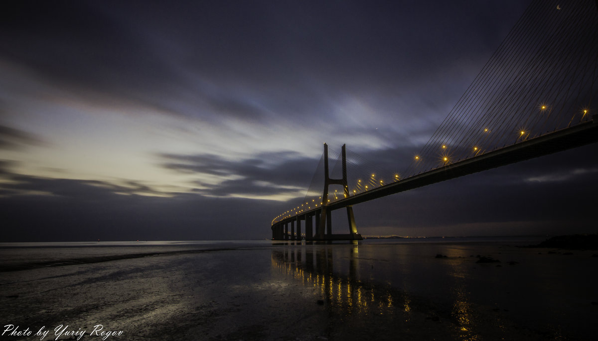 Vasco da Gama Bridge. Lisbon. Portugal* - Yuriy Rogov