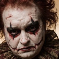 A spooky elegant clown with striking facial features :: Vsevolod Boicenka