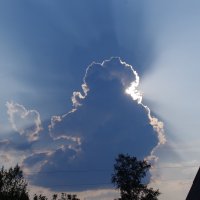 Солнце за облаком